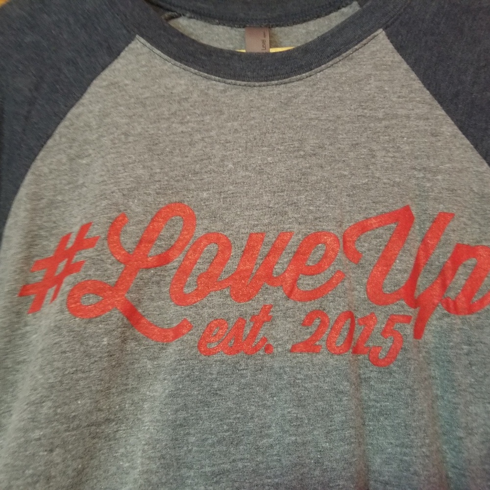 # LOVE UP Next Level Baseball Tee